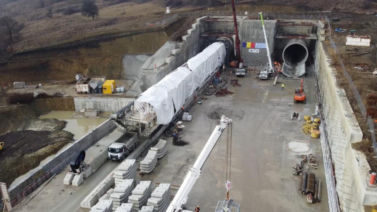 Tunnel boring machine components delivered to the tunnel portal