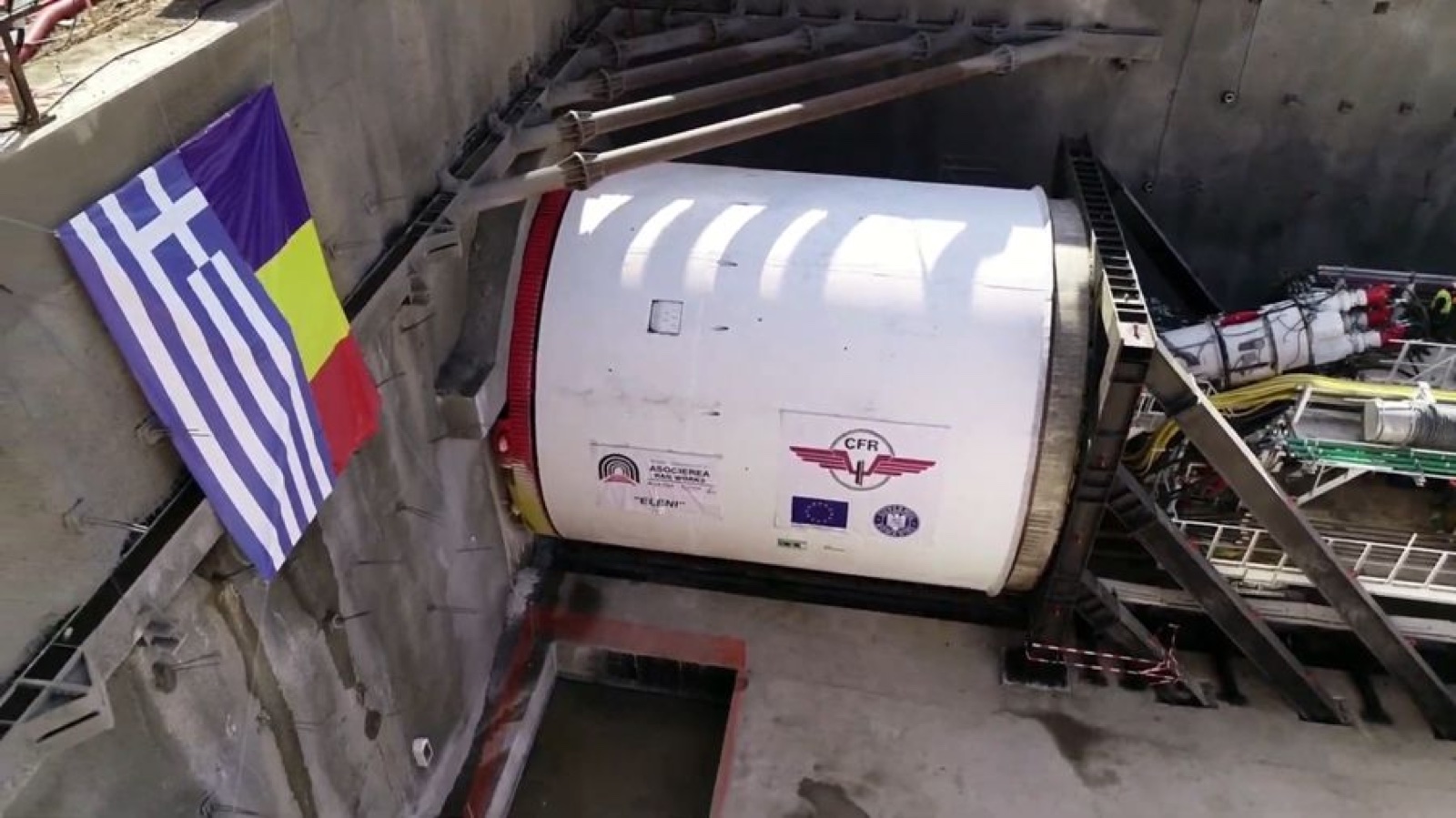 Tunnel boring machine shield installed at the tunnel portal